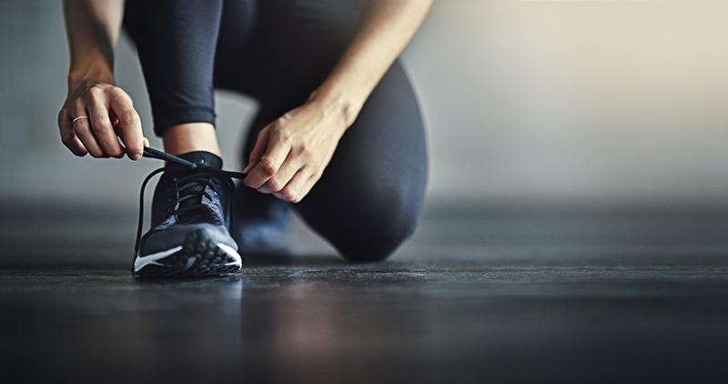 runner tying shoe GettyImages-618982838