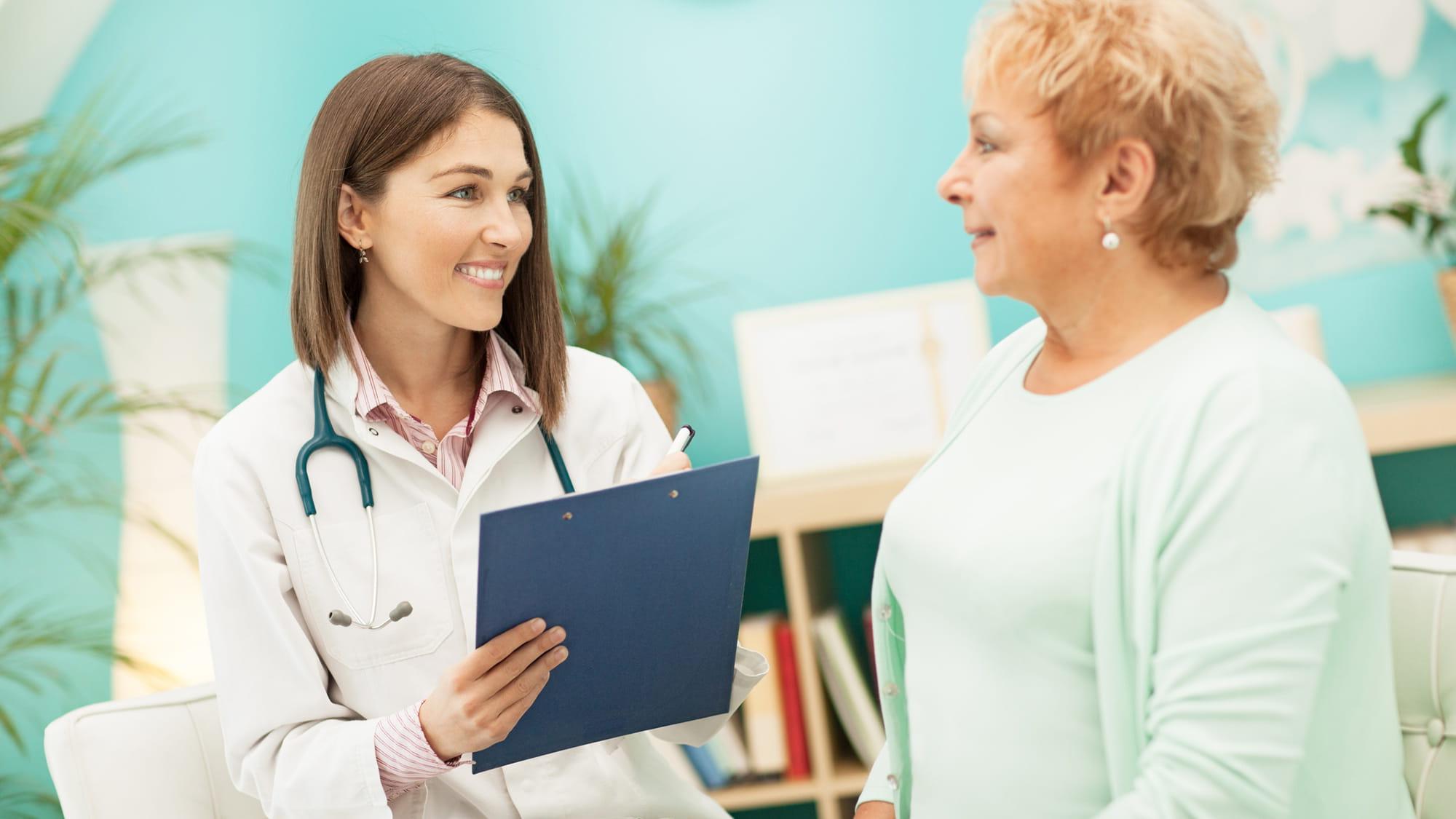 doctor talking with patient